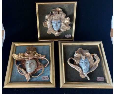 Nigel John Wilde three relief moulded and gold lustre studio pottery portrait plaques fabric mounted and in gilt frames initi