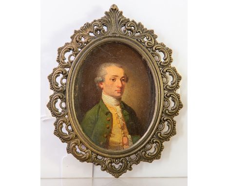British School, late 18th Century, oval portrait miniature of a young gentleman, wearing a white stock, green jacket and yell