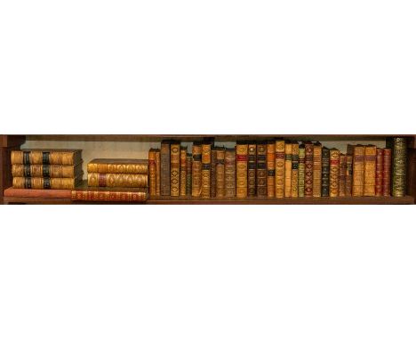 Bindings. Collection of leather-bound books, predominantly 19th century, including part-sets and school prizes; some handsome