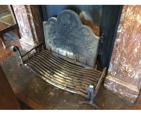 An early 18th century cast iron fireplace, circa 1719, detailed background of a lion rampant, English rose, Scottish Thistle 