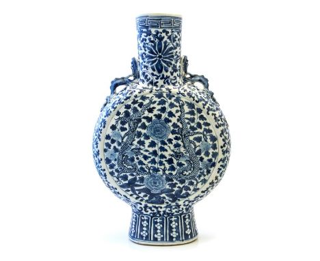 A large 19th Century Chinese twin handled blue and white moon flask vase, decorated on both sides with twin facing chasing dr