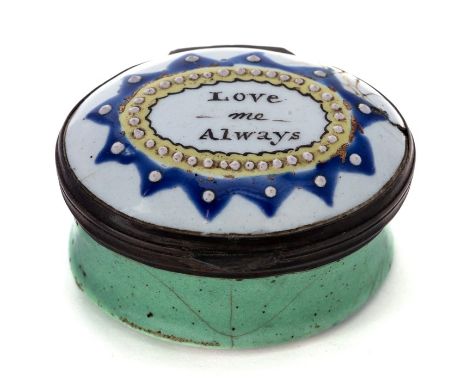 A late 18th Century Bilston enamel oval patch box, the hinged jewelled cover with motto 'Love me Always', width 4cm (s.d)