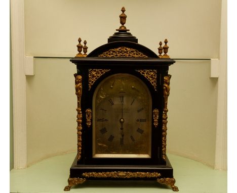 A mid to late 19th Century musical bracket clock by Smith &amp; Sons, Clerkenwell, ebonised case of Baroque design with gilt 