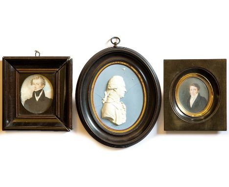 Two Regency oval portrait miniatures on ivory, a young dandy, 7 by 6cm and young gentleman wearing a white stock, 6 by 5cm, b