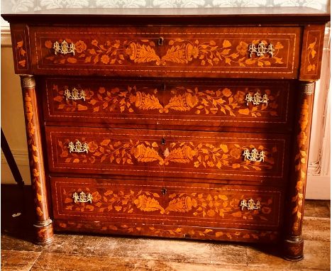 An 18th Century Dutch marquetry inlaid commode, drawer to top, three drawers below, projecting turned columns, ormolu handles