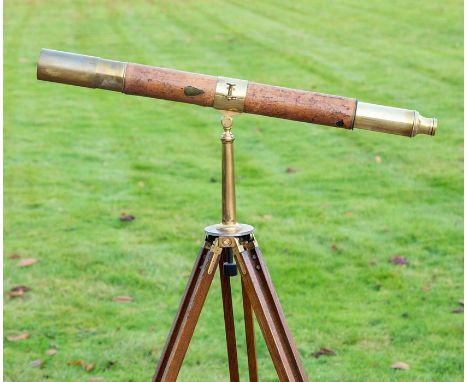 A 19th Century single draw brass telescope, signed Dollond, London,  Achromatic Night, also engraved with crest and motto, le