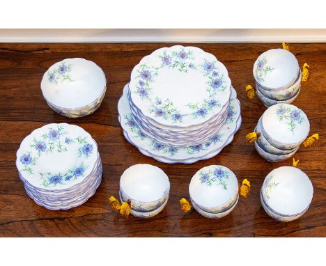 A set of Aynsley tea wares, circa 1930's, cornflower pattern with yellow butterfly handles, No 765788, comprising twelve tea 