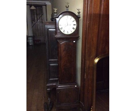 A mid 19th century mahogany longcase clock by J Norris of Notting Hill, London, circa 1850, three brass sculptures of eagle f