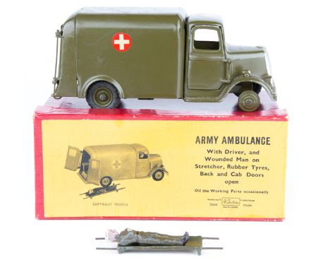 A Britains Army Ambulance No.1512. 1950’s example with opening driver’s door, opening rear doors, driver, patient and stretch