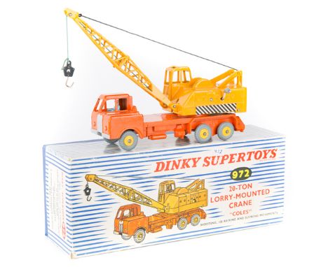 A late issue Dinky Supertoys 20-Ton Lorry Mounted ‘Coles’ Crane (972). In orange and yellow livery, example with chevrons to 