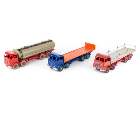 3 Dinky Toys Foden 8-wheel lorries. All the later FG type. A tanker in red with red wheels and fawn tank. A flat-bed with cha