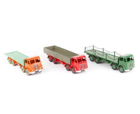 3 Dinky Toys Foden 8-wheel lorries. All the later FG type. A wagon in red with red wheels and grey body. A flatbed with chain