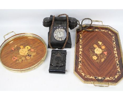 Two Italian twin handled trays, a vintage dial telephone and a Rajar No 6 camera.