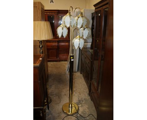 A MODERN 'TEAR DROP' STYLE LAMP STANDARD