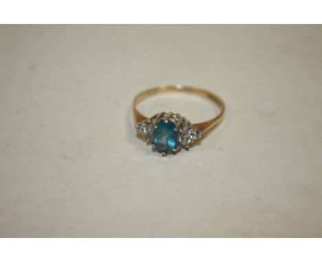 A HALLMARKED 9CT GOLD BLUE TOPAZ DRESS RING