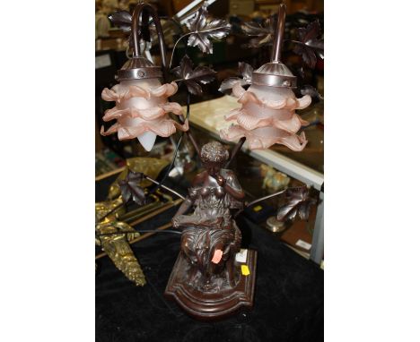 A FIGURATIVE TABLE LAMP WITH FLORAL GLASS SHADES