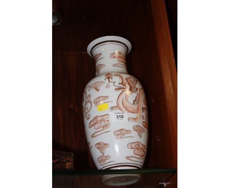 AN ORIENTAL CERAMIC VASE WITH LAMP CONVERSION HOLE TO BASE DECORATED WITH DRAGONS 