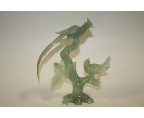 A JADE STYLE GREEN STONE CARVING OF TWO BIRDS ON A BRANCH A/F