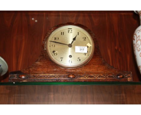 A VINTAGE OAK NAPOLEON HAT MANTEL CLOCK 