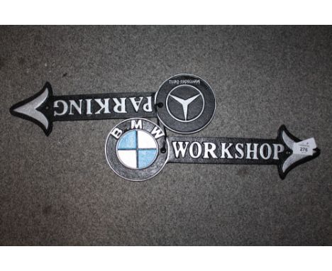 ***TWO MODERN CAST METAL ARROW SIGNS