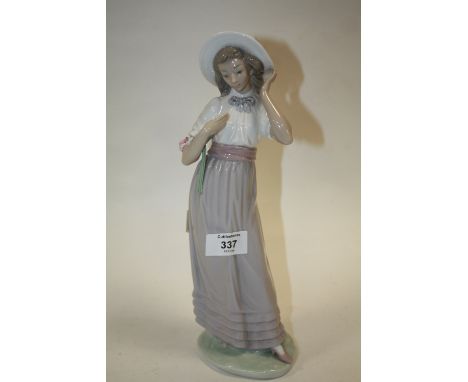 A LARGE NAO FIGURE OF A LADY