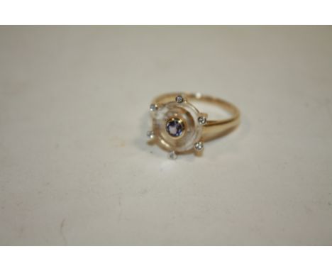 A HALLMARKED 9K GOLD WHITE QUARTZ, TANZANITE AND DIAMOND RING, the white quartz is 3.46 carats measuring 12 mm x 12 mm, weigh