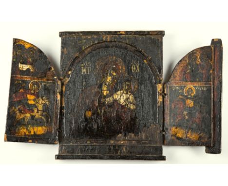 An 18th century travelling triptych icon of Mother of Christ and Child the central panel flanked by two folding arched doors,