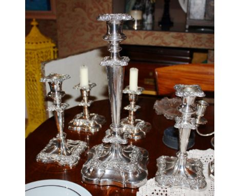 A matched suite of five graduated silver plated copper candlesticks c.1900, comprising one 13½in. candlestick, a matching pai