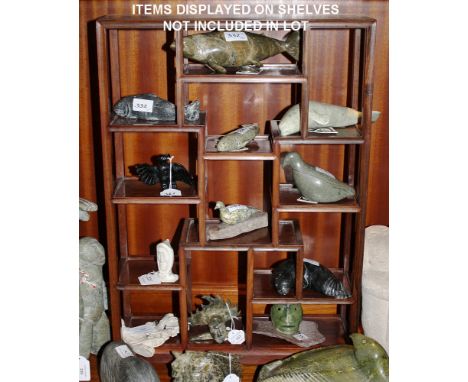 A miniature Oriental hardwood 'room divider' style display shelf unit 26in. (66cm.) high, 17.75in. (45cm.) wide, together wit
