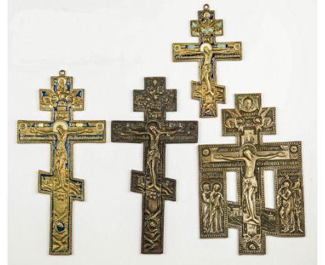 Two brass and enamel Orthodox Blessing Crosses together with two other brass crosses, one of which retains some silver platin
