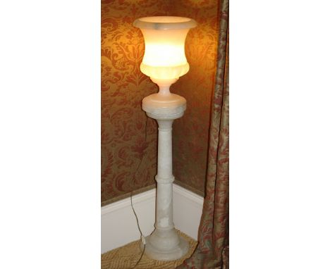 An alabaster urn on turned pedestal 20th century, the urn converted to a lamp, 44.5in. (113cm.) high, together with a smaller