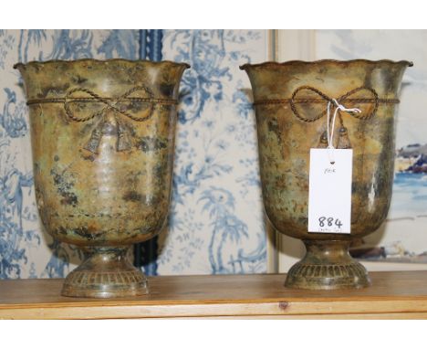 A pair of patinated bronze-style vases.