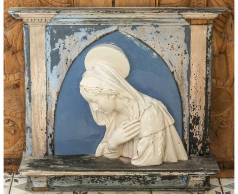 An Italian Della Robbia style maiolica plaque of the Madonna probably late 19th / early 20th century, Gothic arched shape wit