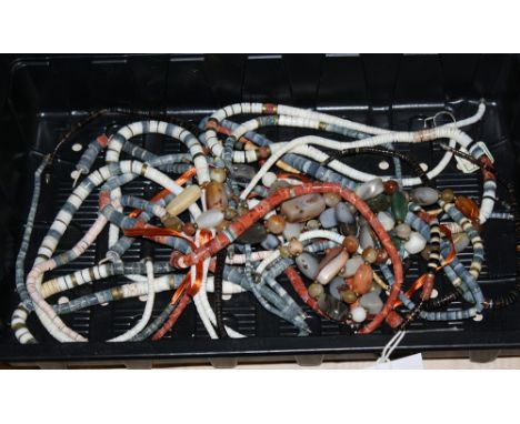 A collection of coral necklaces.