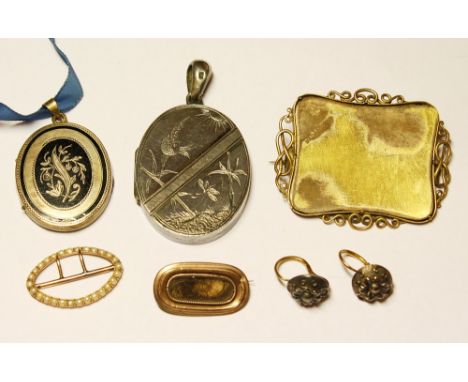 A Georgian rose gold and seed pearl buckle together with a 19th century rose gold mourning brooch; a pair of Edwardian gold e