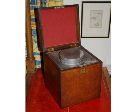 A 19th century walnut tea caddy box, the square box containing a lead caddy with painted Chinese script, 8 x 8in., 9½in. high