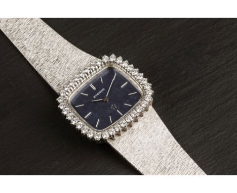 An Eterna 18ct white gold and diamond ladies cocktail wrist watch the rounded rectangular 19 x 16mm. dark blue weave effect d