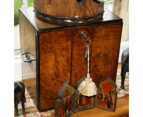 An early Victorian walnut jewellery box of square form with caddy top and flared base, the interior lined with dark blue shot