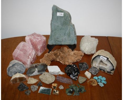 A large rock crystal specimen 4.5in. (11.5cm.) high; together with a cut and polished specimen of New Zealand Nephrite Jade, 