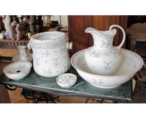 A seven piece jug and basin set c.1910, marked 'Bisto', blue sprig pattern, comprising a jug, basin, lidded slop pail, sponge