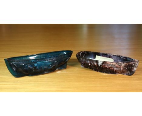 A Sowerby purple malachite glass boat posy trough 4½in. (11.5cm.) long; together with a Sowerby clear blue glass boat posy tr