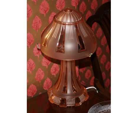 A 1930s Art Deco pink glass 'mushroom' table lamp 13in. (33cm.) high.