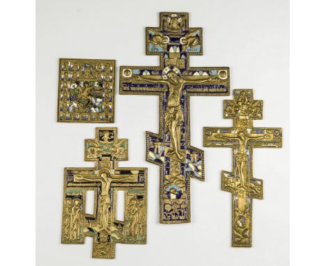 A brass and enamel Orthodox Blessing Cross the background with dark and pale blue and white enamel; together with two smaller