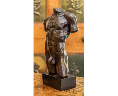 A bronze statue of a nude male torso signed 'Le Nantec' and dated '90, from an edition of 99, 11in. (28cm.) high.