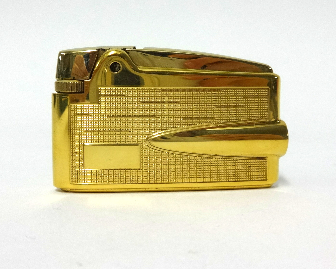 Ronson, adonis a 9ct gold sheath lighter, cased.