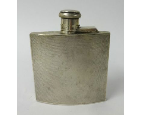 A silver and engine turned hip flask, approx 4.50oz.