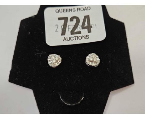 A PAIR OF DIAMOND CLUSTER EAR STUDS SET IN 9ct WHITE GOLD