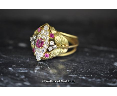 A Ruby and diamond marquise ring, tests as 18ct yellow gold,8.2g