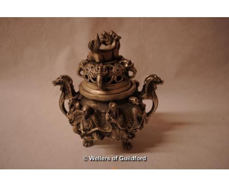 A Chinese white metal circular censor with dog of foe finial, 15cm.