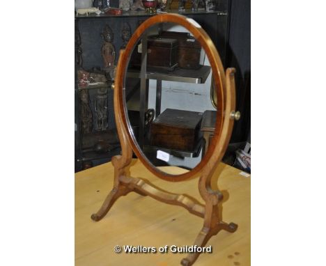 An early 20th Century mahogany skeleton mirror.